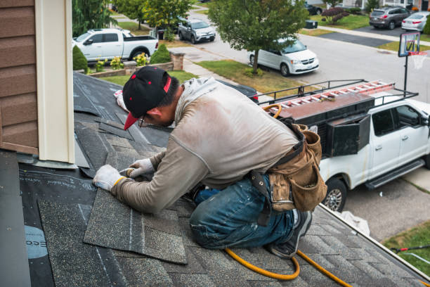 Professional Roof Replacement technician working in Fredericksburg, PA